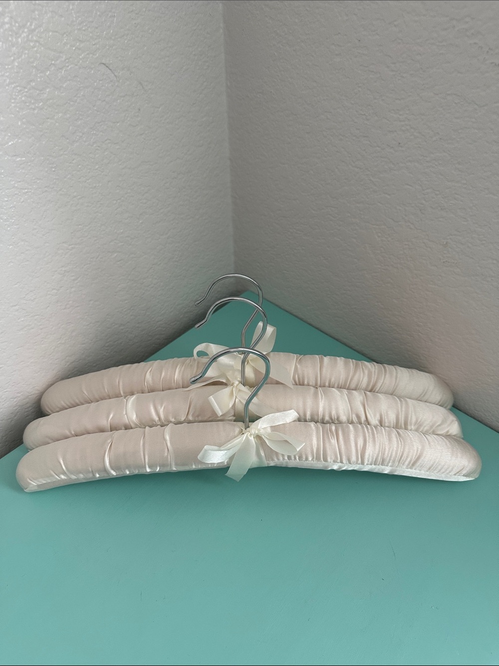 Satin padded heavy duty hangers-set of 3ct.-glossy ivory color & silver hook-new